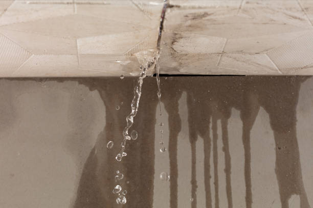 Professional Flood Damage Cleanup technician working in Purcell, MO